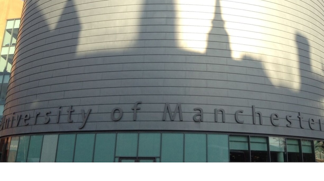 Shadows of neo-gothic towers, spires and roofs from the main University of Manchester building showing up really well on the modern rotundity of University Place, opposite.