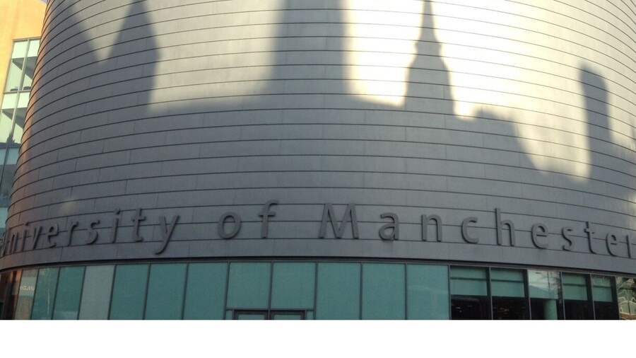 Shadows of neo-gothic towers, spires and roofs from the main University of Manchester building showing up really well on the modern rotundity of University Place, opposite.