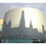 The University of Manchester building with a curved facade and the name inscribed on it.