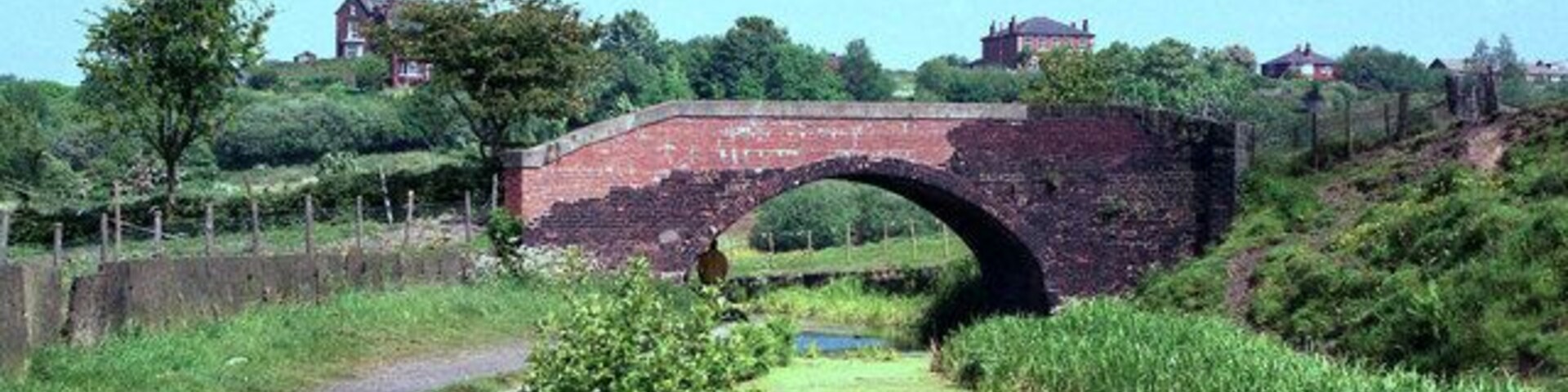 Prestolee Bridge, Manchester Bolton and Bury Canal Looking north-west, i.e. towards the Bury end of the canal. This bridge is very close to Prestolee Aqueduct. It carries a right of way on foot.
