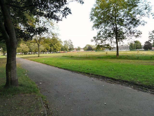 Crowcroft Park According to Manchester City Council http://www.manchester.gov.uk/info/200073/parks_and_open_spaces/2888/crowcroft_park/1 "Crowcroft Park is a true community park ... used for dog walking, children's recreational play, sports, community events, educational activities, bowling and hosting live music. The park has a strong and active Friends of Group who support community events and actively campaign for improvements in the park. In 2008, Crowcroft Park was awarded a Green Flag Award for achieving the national standard for parks and green spaces. Opened in 1900, Crowcroft Park was one of Manchester early parks and was the quintessential Victorian Park with well laid out flower beds, elaborate bandstand, pretty flower borders and abundance of cricket and football, pitches. The park was originally created for recreational purposes for the young residents of the neighbourhood, and in response to the growing need to preserve land for leisure and recreation." It also says that prior to 2001 it was a park in decline, which might explain the police notice on the entrance warning users to mind their valuables and avoid using mobile phones within the park! Much excellent information about the history of the park can be found on the Manchester History website: http://manchesterhistory.net/LONGSIGHT/PARKS/crowcroft.html