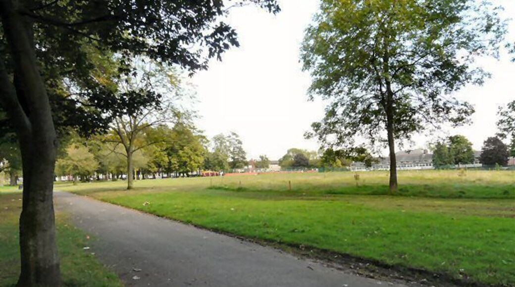 Crowcroft Park According to Manchester City Council http://www.manchester.gov.uk/info/200073/parks_and_open_spaces/2888/crowcroft_park/1 "Crowcroft Park is a true community park ... used for dog walking, children's recreational play, sports, community events, educational activities, bowling and hosting live music. The park has a strong and active Friends of Group who support community events and actively campaign for improvements in the park. In 2008, Crowcroft Park was awarded a Green Flag Award for achieving the national standard for parks and green spaces. Opened in 1900, Crowcroft Park was one of Manchester early parks and was the quintessential Victorian Park with well laid out flower beds, elaborate bandstand, pretty flower borders and abundance of cricket and football, pitches. The park was originally created for recreational purposes for the young residents of the neighbourhood, and in response to the growing need to preserve land for leisure and recreation." It also says that prior to 2001 it was a park in decline, which might explain the police notice on the entrance warning users to mind their valuables and avoid using mobile phones within the park! Much excellent information about the history of the park can be found on the Manchester History website: http://manchesterhistory.net/LONGSIGHT/PARKS/crowcroft.html