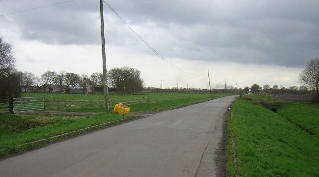 Rindle Road, Astley Moss. Looking south across the flatness of Astley Moss, Rindle Road is the main access point from the north into Chat Moss. On the right is a drainage ditch.