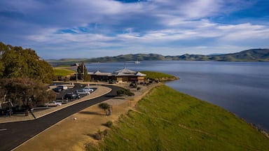 The San Luis Reservoir is an artificial lake on San Luis Creek in the eastern slopes of the Diablo Range of Merced County.. It is the fifth largest reservoir in California. Aerial photo.