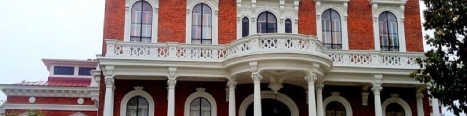 One of Georgia’s most distinguished structures, the Johnston-Felton-Hay House in Macon was declared a National Historic Landmark in 1974. It was built from 1855 to 1859 in the Italian Renaissance Revival style, a marked contrast to the more restrained Greek Revival architecture of the antebellum period.
The 18,000-square-foot mansion spans four levels and is crowned by a three-story cupola. Commissioned by imaginative owners and constructed by the most skillful workers of the time, its technological amenities were unsurpassed in the mid-19th century: hot and cold running water, central heat, a speaker-tube system, in-house kitchen and an elaborate ventilation system.
Only two families lived in Hay House over three generations. Most of the museum’s furnishings date from the Hay family’s occupancy (1926-1962). A few pieces are from the Johnston family (1860-1896), most notably the Eastlake-style dining room suite. The most important piece in the collection may be the 1857 marble statue, "Ruth Gleaning," by American expatriate sculptor Randolph Rogers.
The Johnstons
William Butler Johnston was no typical nineteenth-century Southerner. He obtained his substantial wealth through investments in banking, railroads and public utilities rather than from the agrarian cotton economy. In 1851, he married Anne Clark Tracy, 20 years his junior, and the two embarked on an extended honeymoon in Europe. During their trip, the Johnston's visited hundreds of museums, historic sites and art studios. They collected fine porcelains, sculptures and paintings as mementos of their Grand Tour. The Johnston's were inspired by the Italian architecture they observed and, upon their return to America, constructed a monumental Italian Renaissance Revival mansion in Macon.
The Feltons
Completed in 1859 and called the "Palace of the South," the residence was decorated and furnished in accordance with wealth and good taste. It became a beloved home for the Johnston's, their daughters and their extended family. After the death of Mrs. Johnston in 1896, daughter Mary Ellen and her husband William H. Felton lived in the house. They remodeled and redecorated parts of the house, updated the plumbing and added electricity.
The Hays
After the deaths of Judge and Ms. Felton in 1926, Felton heirs sold the house to Parks Lee Hay, founder of the Banker's Health & Life Insurance Company. The Hays substantially redecorated the house to reflect the changing character of twentieth-century living, and the house at 934 Georgia Avenue continued to be recognized as a local landmark for gracious living during the Hay ownership.
After Mrs. Hay's death in 1962, her heirs established the P.L. Hay Foundation and operated the house as a private house museum. In 1977, ownership of the house was formally transferred to the Georgia Trust for Historic Preservation. The house has been operated by the Trust since that time and has been designated as a National Historic Landmark.