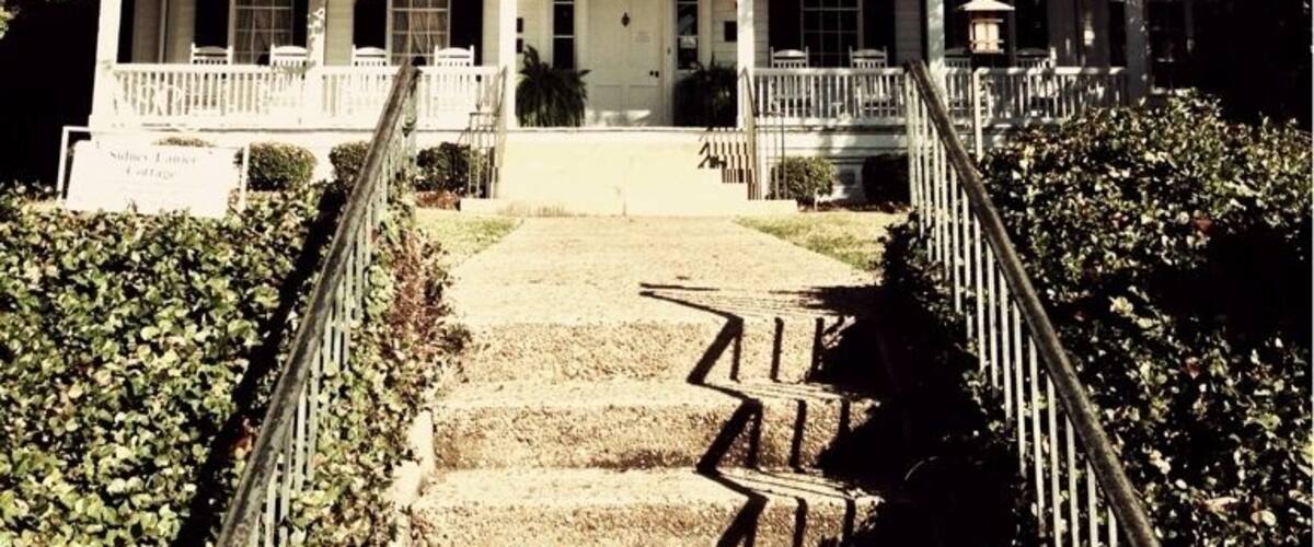 Sidney Lanier, poet, linguist, musician, mathematician and lawyer, was born in this cottage on February 3, 1842. He graduated from Oglethorpe University, then at Milledgeville, served as a private in the Confederate Army and was captured while commanding a blockade runner. Lanier was married in 1867 to Mary Day of Macon where he practiced law with his father. Moving to Maryland, he lectured at Johns Hopkins while carrying on his writing. He died at Lynn, North Carolina on September 7, 1881. Among his best known works are "The Marshes of Glynn" and "Song of the Chattahoochee."