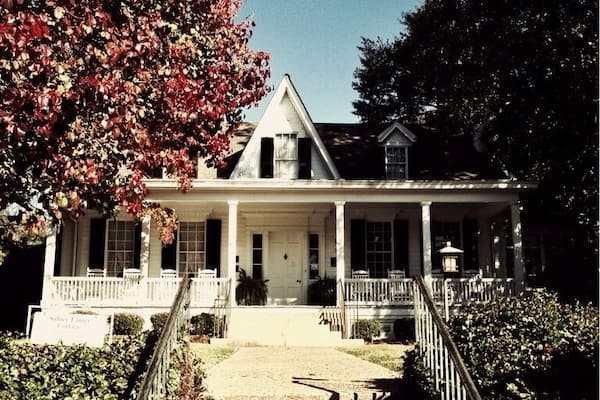 Sidney Lanier, poet, linguist, musician, mathematician and lawyer, was born in this cottage on February 3, 1842. He graduated from Oglethorpe University, then at Milledgeville, served as a private in the Confederate Army and was captured while commanding a blockade runner. Lanier was married in 1867 to Mary Day of Macon where he practiced law with his father. Moving to Maryland, he lectured at Johns Hopkins while carrying on his writing. He died at Lynn, North Carolina on September 7, 1881. Among his best known works are "The Marshes of Glynn" and "Song of the Chattahoochee."