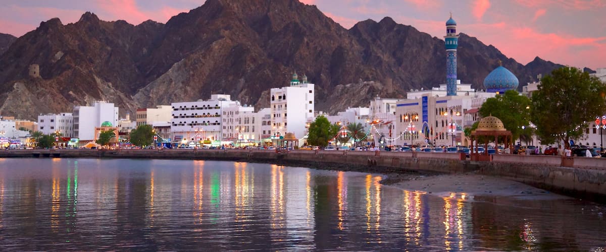 Muscat which includes general coastal views and a sunset