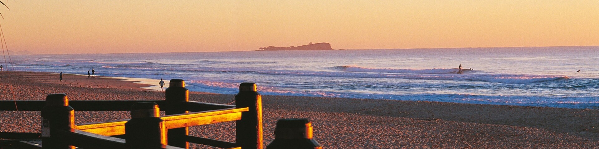 Maroochydore which includes a sunset and a sandy beach