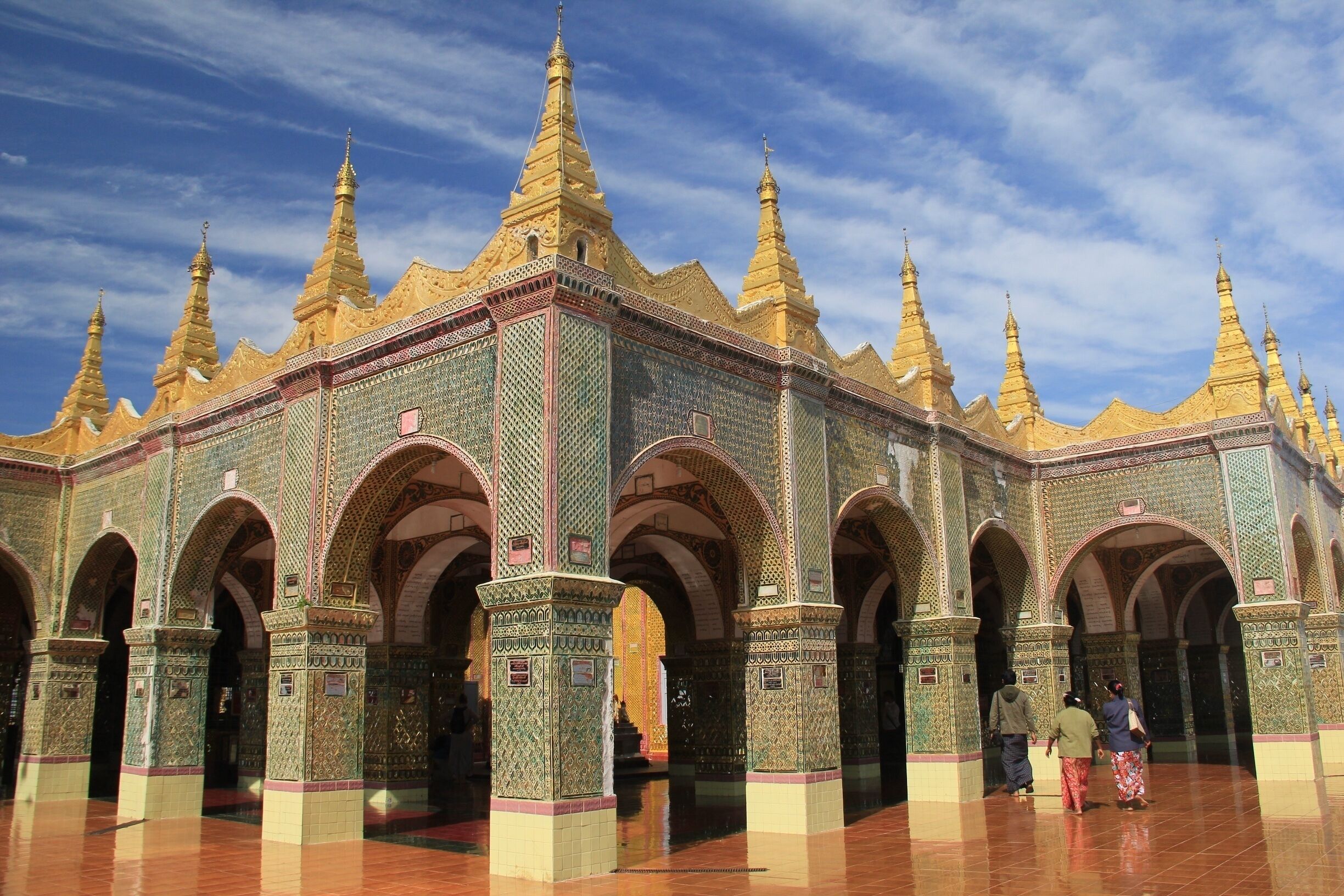 Standing 240 metres above the city of Mandalay, Mandalay Hill offers amazing panoramic views of the city and surrounding countryside.

At the top of Mandalay Hill is Su Taung Pyae Pagoda, a major pilgrimage site for Burmese Buddhists for nearly two centuries.

With polished marble floors, mosaic-embedded archways and glistening gold stupas rising up towards a perfect cloud-brushed sky, this place was pretty spectacular even without the views.  But add those into the equation and you’ve got somewhere worth making a brief stop in Mandalay for.

Read more about Mandalay Hill and the Su Taung Pyi Pagoda here:

http://galloparoundtheglobe.com/a-morning-at-mandalay-hill-myanmar/