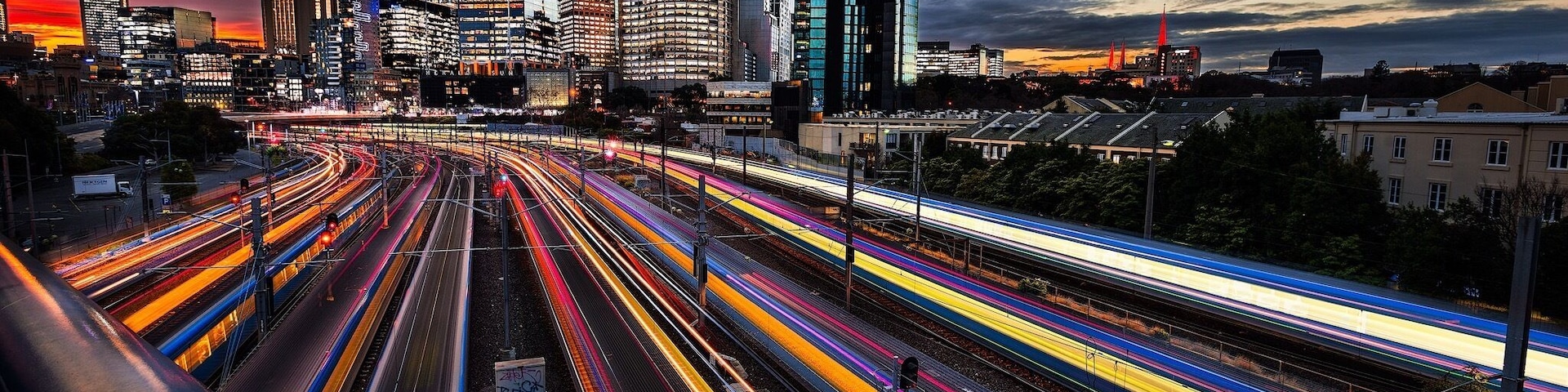 This photograph was taken last year, about six months ago, just before the sun hit the horizon at its very last light. Even though it was raining all day long the rain had stopped when I got out to the location. I love the dramatic sky and the little patches of pinkish/purplish hues in the clouds and how the lights from the busy trains are leading your eyes toward the city. Melbourne never disappoints.
I hope you like it.