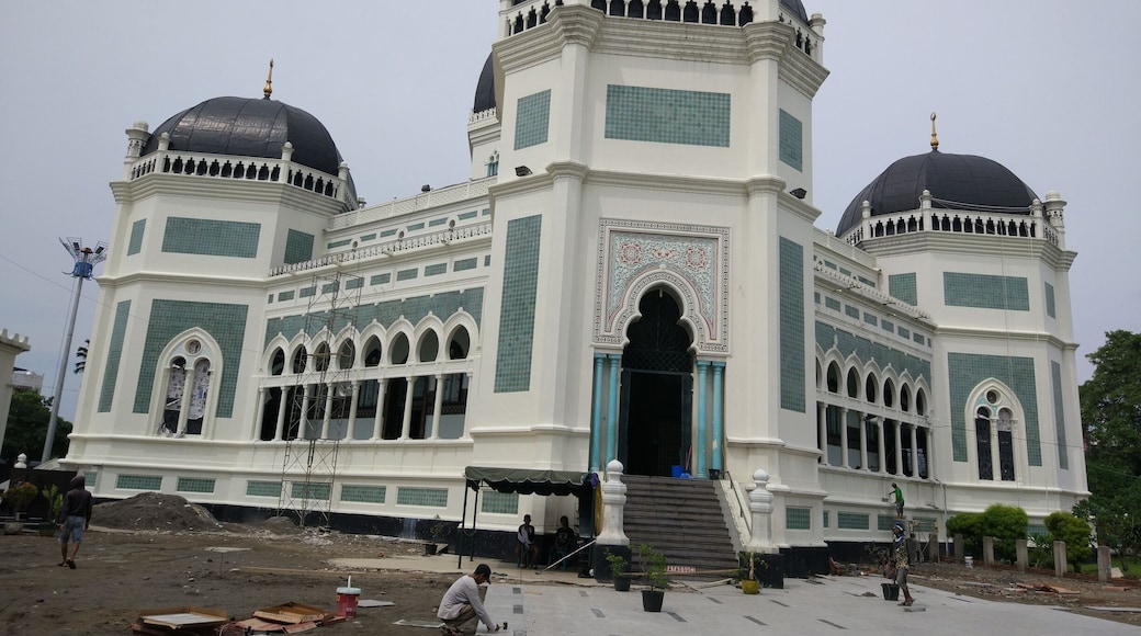 The mosque is currently being renovated but is still open to the public. It was built by the Dutch & contains marble from Italy; a Chandelier from France; & stained glass from Spain.