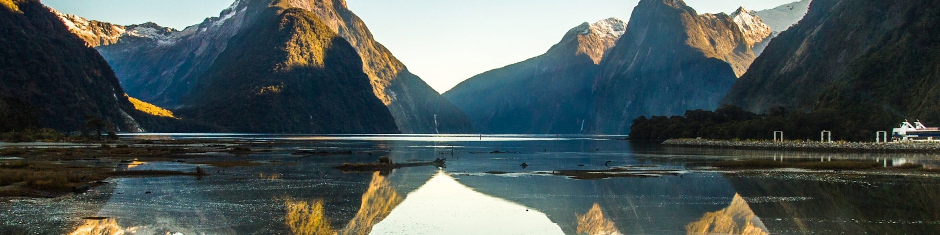 Milford Sound showing mountains and a river or creek