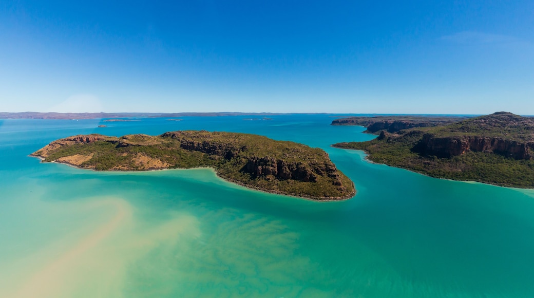 Landscape aerial view of Naturalist Island in Prince Frederick Harbor, North Kimberley. Frequenctly visited by cruise ships, a beach serves as a helicopter landing pad for sightseeing flights