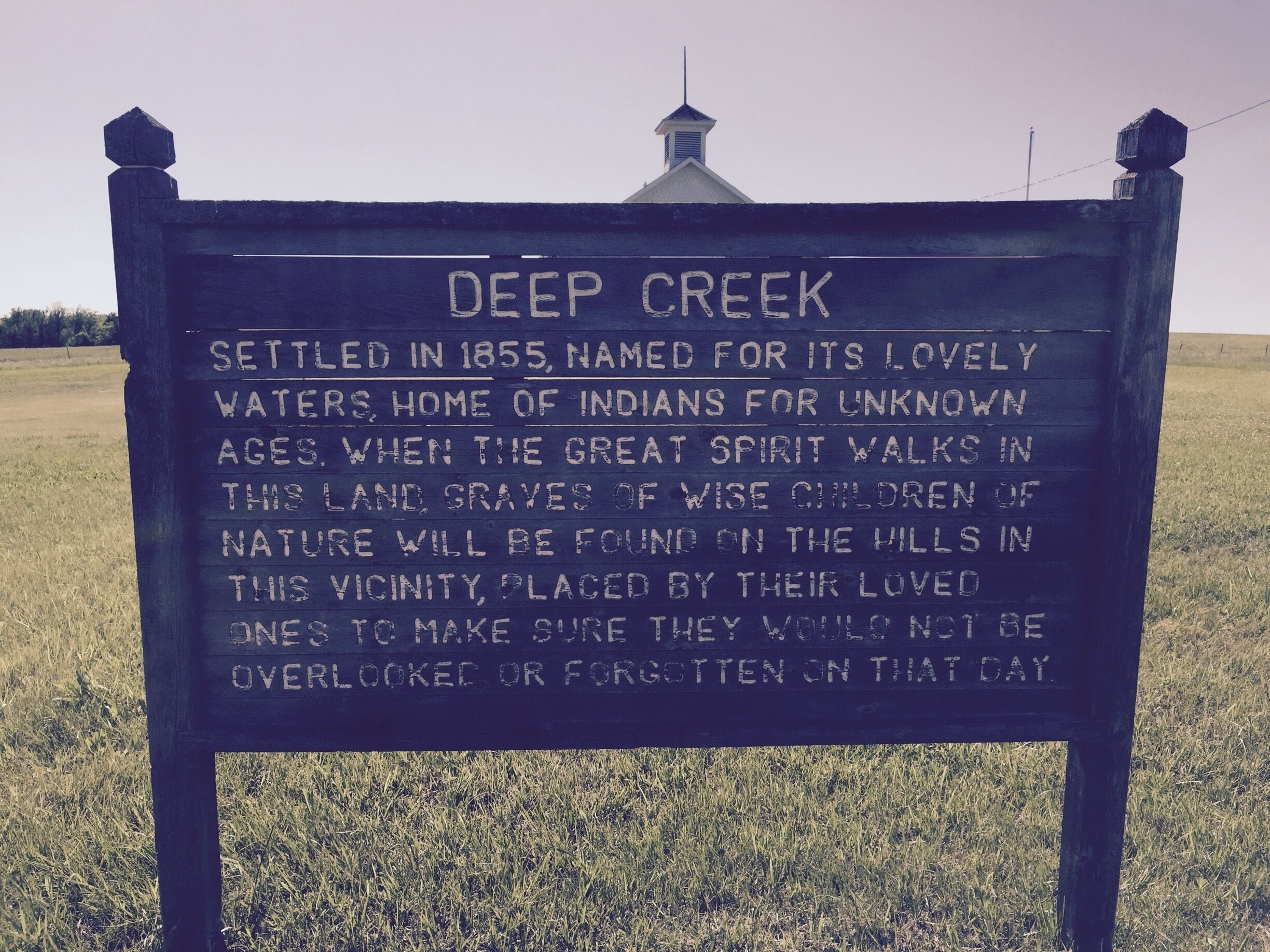 The Deep Creek school house sits along Deep Creek Rd. Between its junction with I-70 and KS177. The drive through this Flint Hills valley is just beautiful. Take a moment to stop and read the signs around the school house, which stands as a memorial to many. 