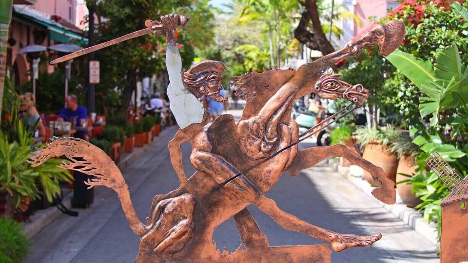 Don Quixote on Espanola Way in South Beach, Miami.
This is a quaint little neighborhood that has a historic village feeling to it. There are no cars, only walkers but watch the bicycles. Well worth visiting if in South Beach, only a few blocks from the beach. The area is quiet and very relaxing, easy to forget about the traffic not far on Collins Rd or Ocean Drive. I've had a late lunch at Havana 1957 and dinner at Tapas and Tintos and left there full and happy.