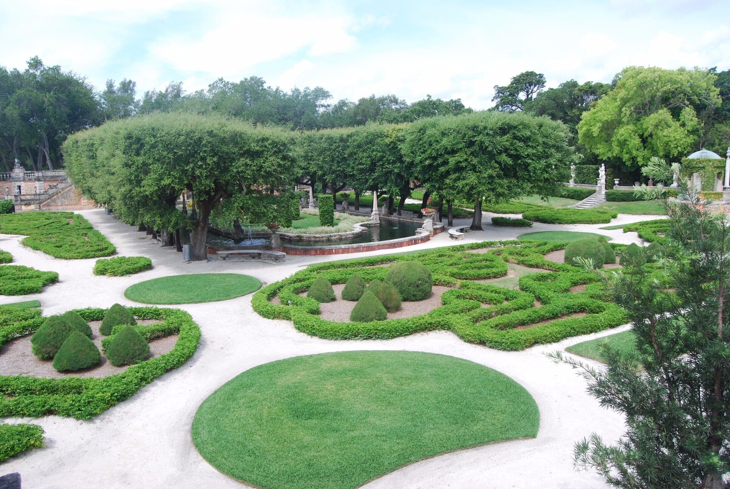 Vizcaya is an estate that was built in the early 1900’s by James Deering. He was inspired by European architecture, specifically Italian villas, but also wanted to include traditional Florida history and materials in his home. The unique mix of European and Floridian design is so interesting and beautiful. As we drove through the gates, we felt as if we stepped out of Miami and into a totally different world. We were in awe that this estate sat literally a mile down the road from the renown skyline, bikinis, and bars of Miami.  

It is open every day from 9:30 - 4:30 except on Tuesdays when it is closed. It is $18 dollars for adults, $10 for students, and $6 for children. It is worth every penny!