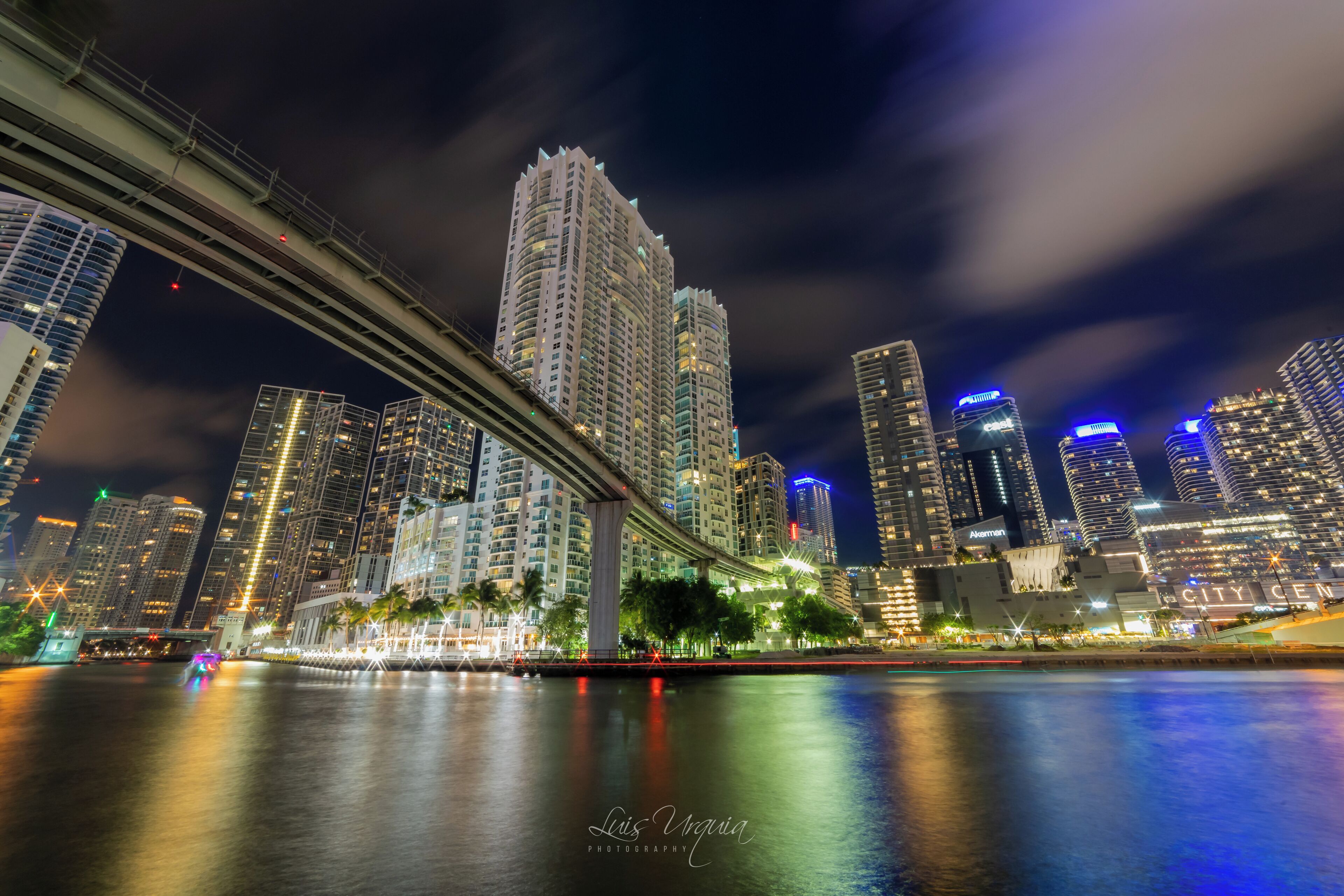 This place is right behind the James L Knight Center, right between the Brickell Avenue and the S.E. 2nd Avenue bridge. I was on the North side of the Miami River pointing my camera South East. I found plenty of parking for a reasonable price. Best time if you want lots of action would be Friday or Saturday night. For a more desolate nights I would recommend Monday thru Thursday night. Here you will find an incredible amount of photography opportunities to shoot for. While like any big city you will find a few homeless folks, the place was very clean and very well kept. Lots of new, very tall buildings have made the Miami landscape a very popular site for photography!