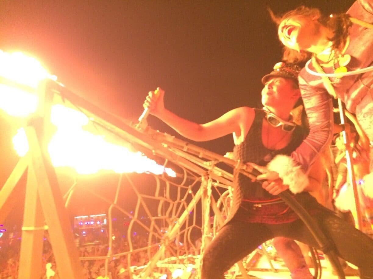 Feel like blasting a flame cannon to a techno beat-drop?  Head to Burningman next year!  Here, friends Nina and Suzy show how it's done.  