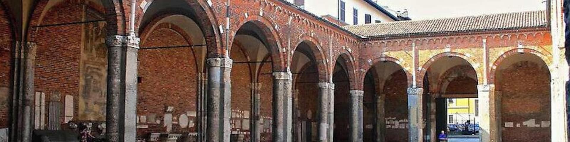 The Ancient basilica of Saint Ambrogio.
The portico's arcade are supported by pillars, flanked by semi-columns. They have double archivolts, while the portico's upper frame is decorated with Lombard bands, which are repeated also on the façade. Thin lesenes start from the pillars' centres, reaching the upper frame. The capitals are decorated by animal (lions, wild boars), and human figures (mostly heads, but also angels and others), as well as by vegetable or fantastic motifs of pre-Romanesque origin.#architecture #roadtrip