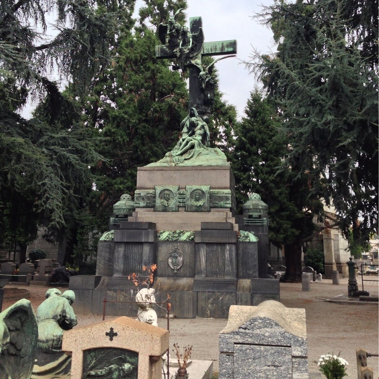 Amazing cemetery in Milan!! Milan's wealthy families seemed to try and top each other by building large tombs often decorated with plenty of sculptures of angels, putti, sphinx or other figures. All kind of architectural styles were used, from Egyptian, neo-Roman and Byzantine over neo-Gothic to more modern styles such as Art Nouveau, modernist and even post-modern. 

The sheer number of different works of art by often highly acclaimed artists resulted in an interesting open air museum, where visitors are easily overwhelmed by the large number of monumental mausoleums and sculptures. Fortunately placards installed on the grounds of the cemetery that show an overview of the most spectacular and most famous graves. 