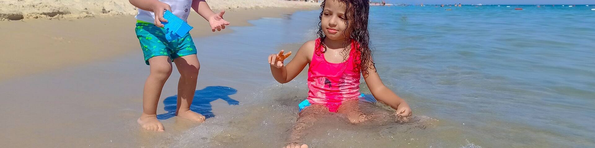 Happy children enjoying their vacation at the beach, in sousse, tunisia