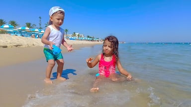 Happy children enjoying their vacation at the beach, in sousse, tunisia