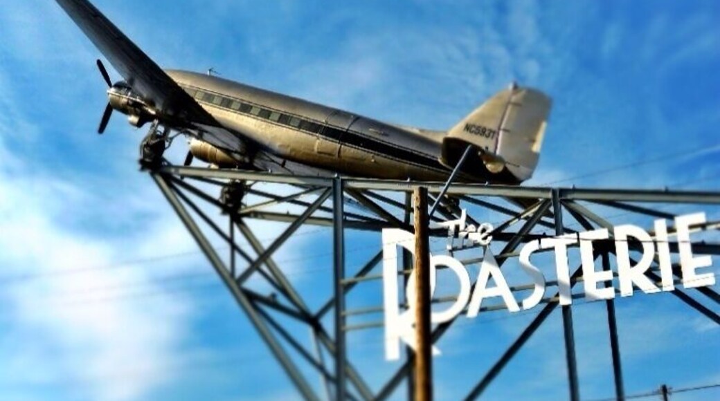 The Roasterie is a specialty coffee-roasting company that services espresso bars, coffeehouses, restaurants, high-end grocers, and coffee Connoisseurs around the world.
the coffee is air-roasted, which helps highlight the origin flavor while unlocking the best of the bean. This is done in house and you get to see it on the tour!
The Roasterie imports only 100 percent Arabica Specialty Grade coffees from
thirty-one different coffee-producing countries.
This company began in 1993, and the plane on top of the building shows off its "air roasting". You can get tours, tastings, or just sit and relax on the deck. It's a lot more chill then any other coffee house, and has great coffee!