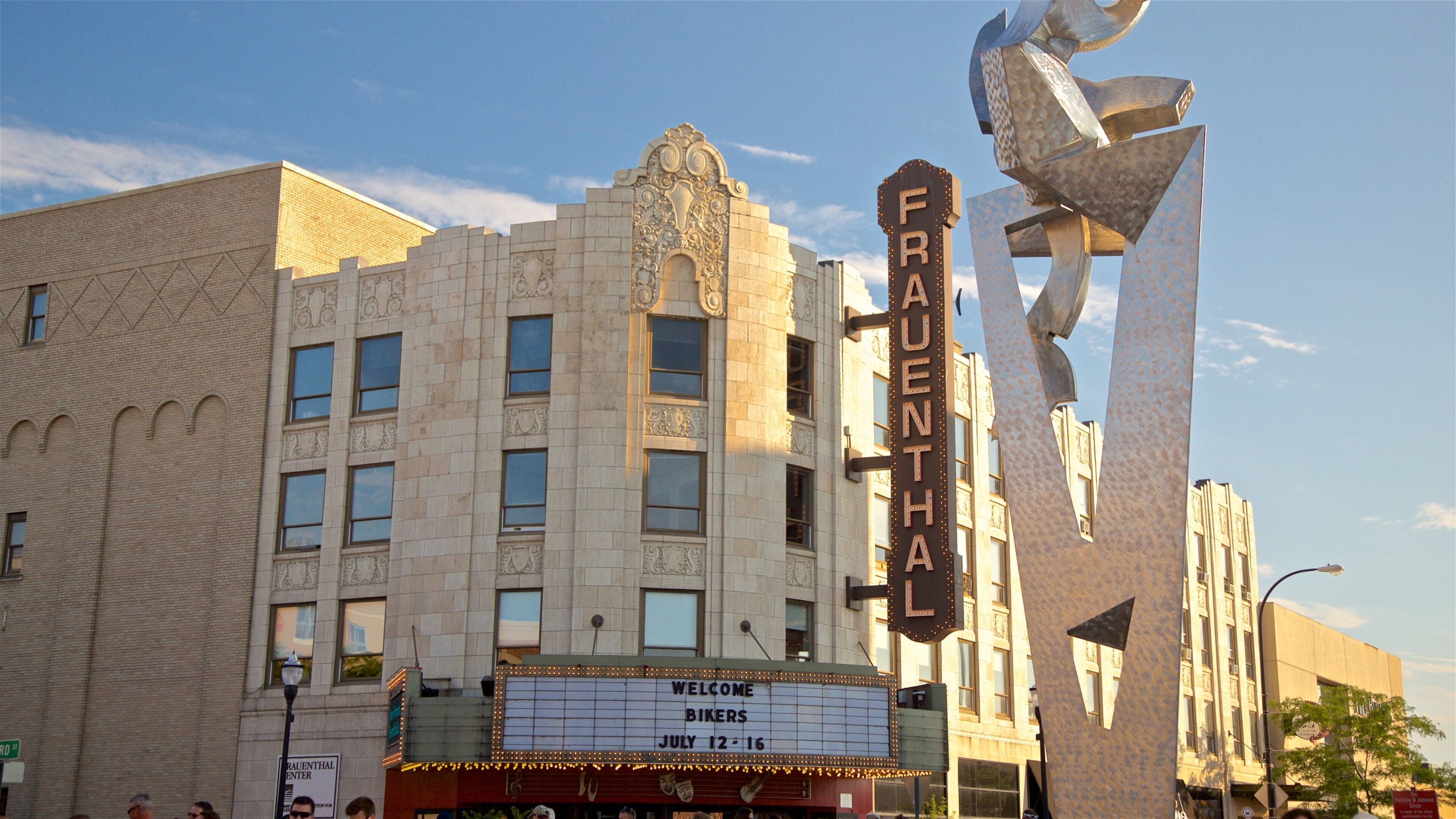 The facade of the Frauenthal building with a marquee sign welcoming bikers for shows from July 12-16.