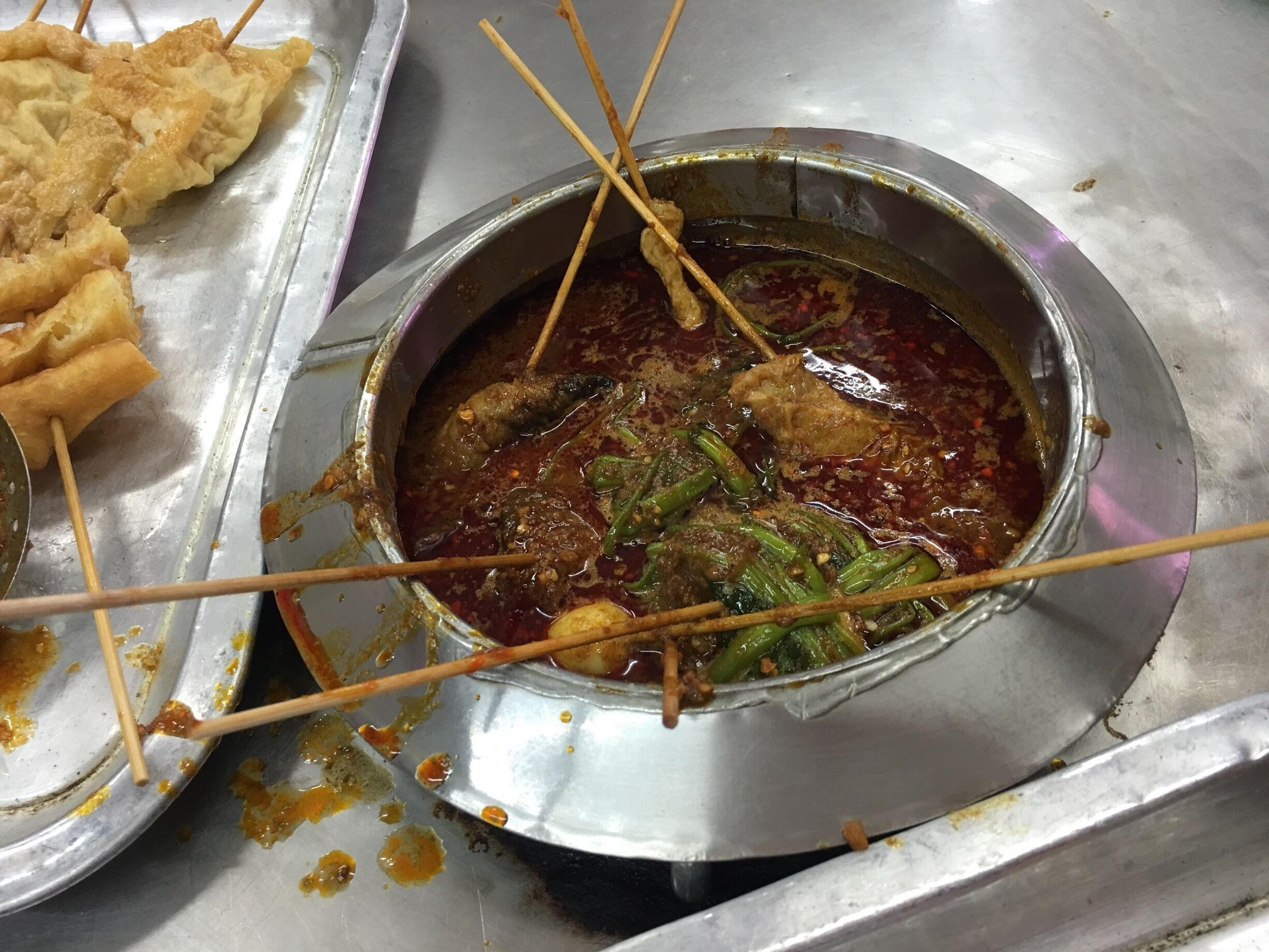 Recommended Satay Celuk is a another speciality.  Consumer may select various type of food  serve on stick to eat with delicious Satay source. The queue to find a place gets longer towards late night. 