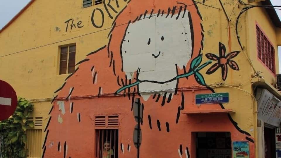 "THE ORANGUTAN HOUSE was established in 1992 as the studio-gallery of Charles CHAM in Malacca, Malaysia. Today, it is one of the most recognisable buildings in Malacca and a must-see for all who visit this World Heritage City." -- https://www.facebook.com/pages/THE-ORANGUTAN-HOUSE/270362069913