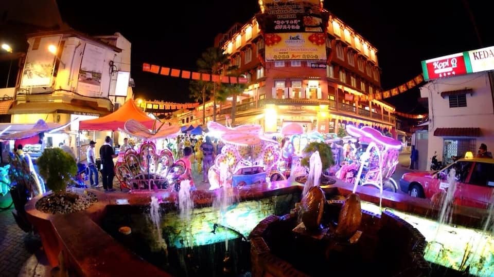 Jonker street at night. It's a walking street ,open for shopping at night. You could see the colorful bicycles for hire all around!
