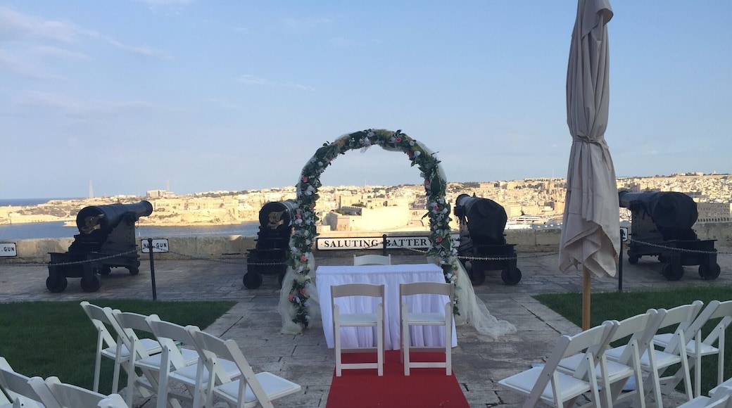 my wedding overlooking the historic Grand Harbour in Valletta #lifeatexpedia #wedding #destinationwedding #view #grandharbour #cannons #redcarpet
