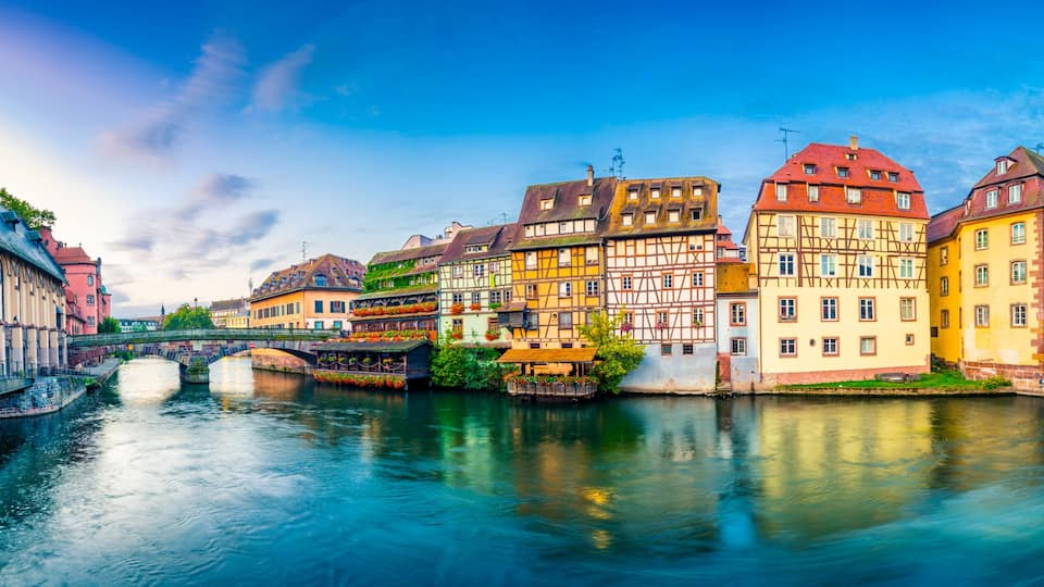 Old town water canal panorama of Strasbourg, Alsace, France. Traditional half timbered houses of Petite France