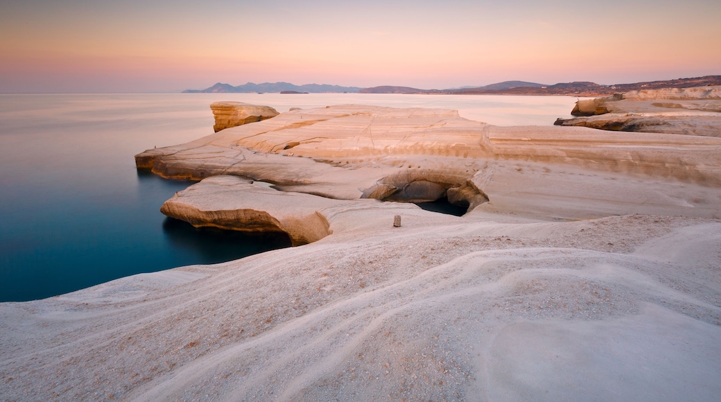 Coastal scenery with pale volcanic rocks near Sarakiniko beach in Milos island, Greece.