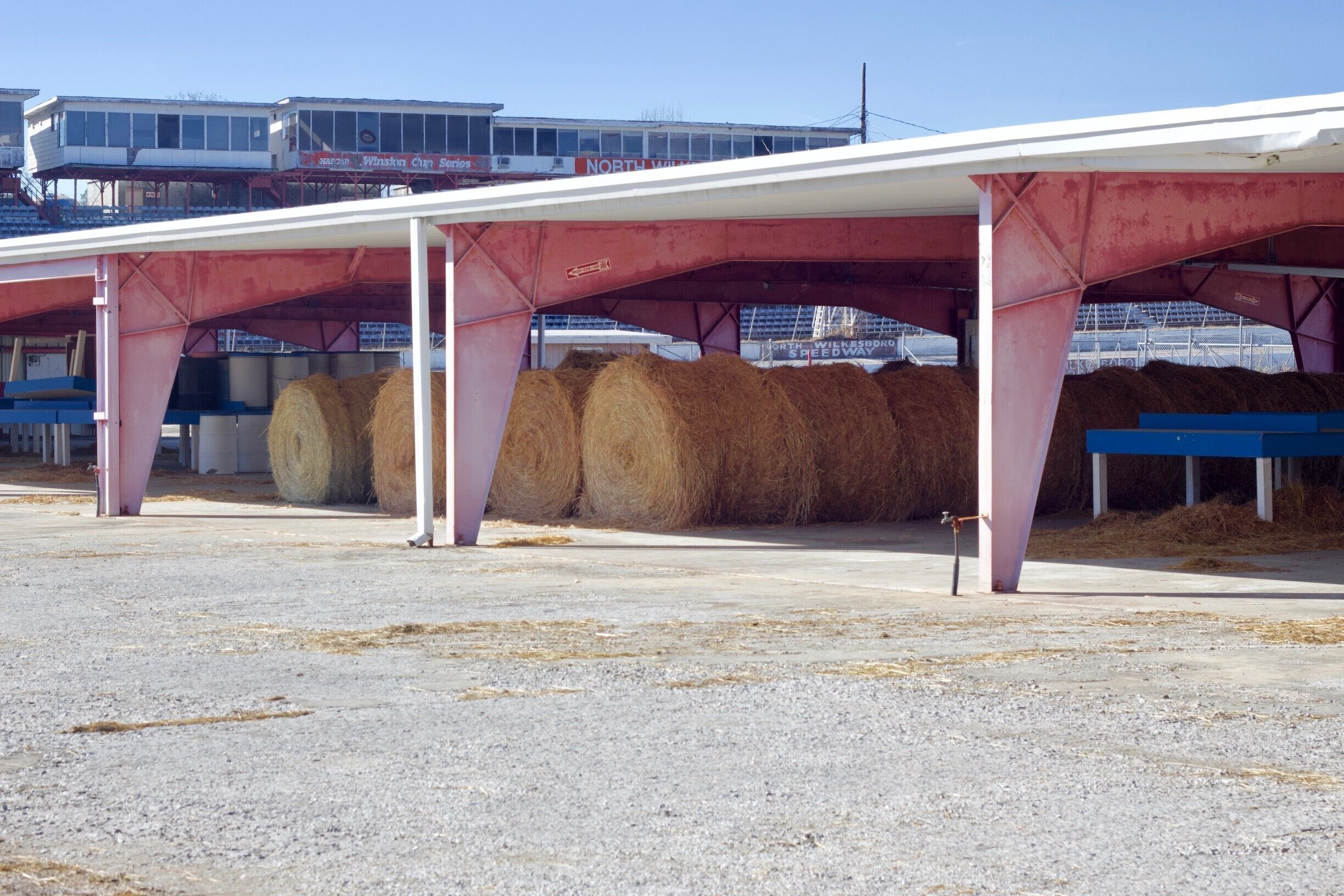 Although most of the stadium appear abandoned to age with the elements, it was made clear here that someone still made use of the pit to store hay bells and empty drums. Much of the structure of the speedway was worn and faded, telling of its age and neglect. But it was clear that it was still providing for someone, somewhere. #appalachianechoes