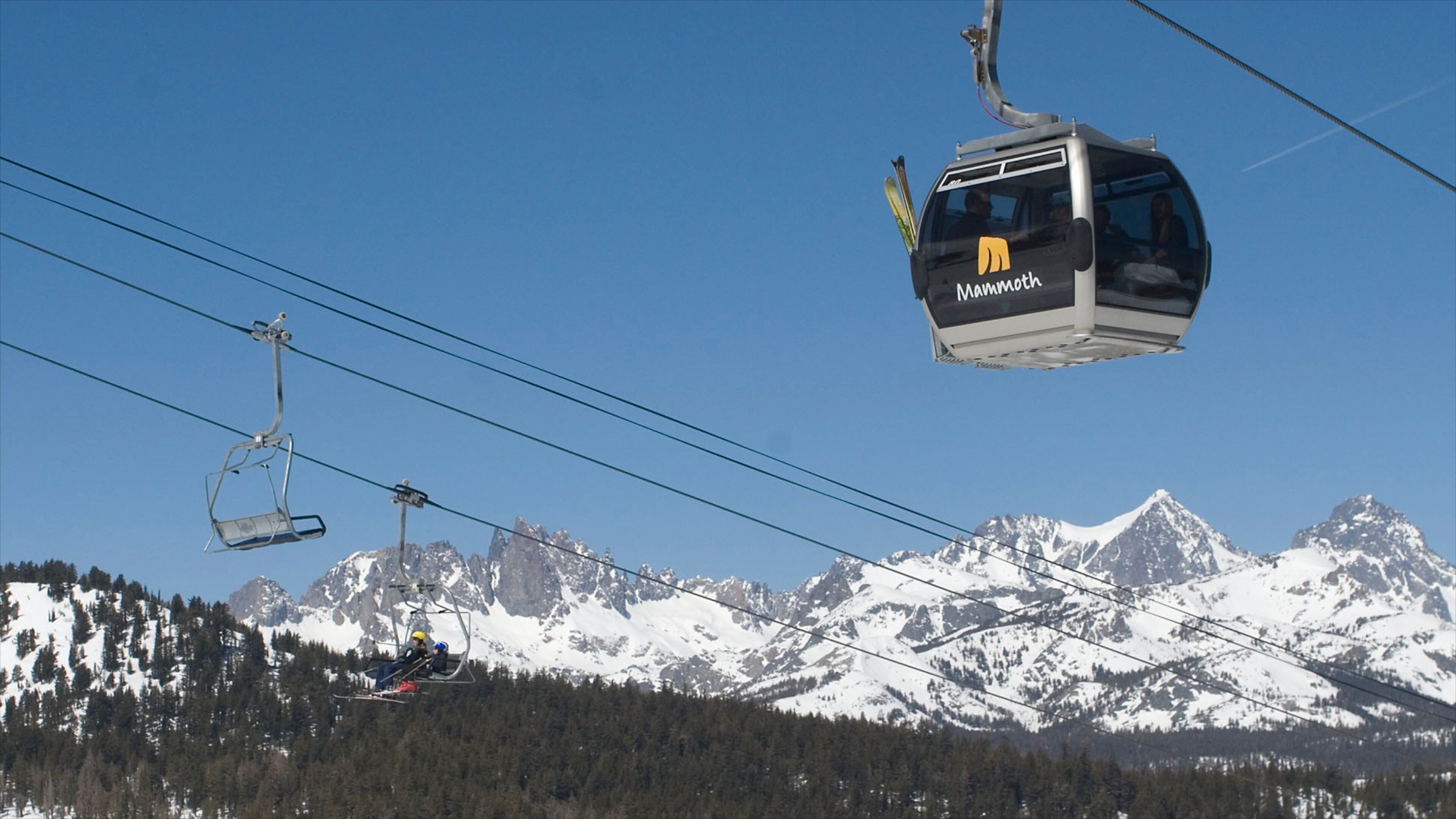 Central Interior California featuring a gondola, mountains and snow