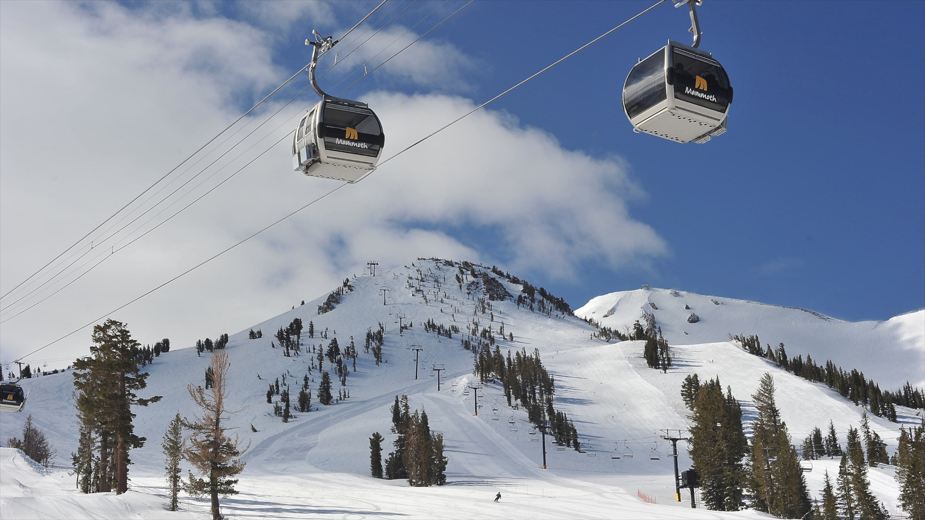 Central Interior California showing snow, a gondola and mountains
