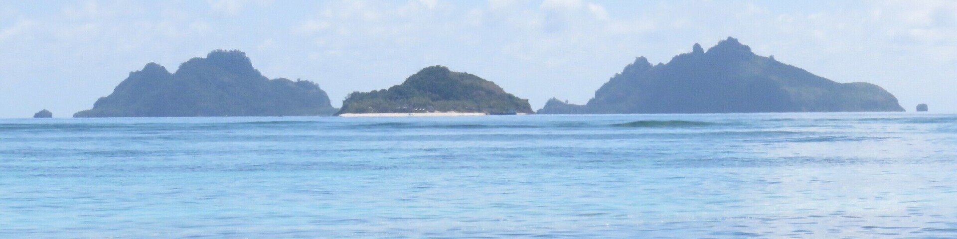 3 more small islands to the north of Mana Island. The island on the left hand side is Monuriki, the same island that Castaway was filmed on.