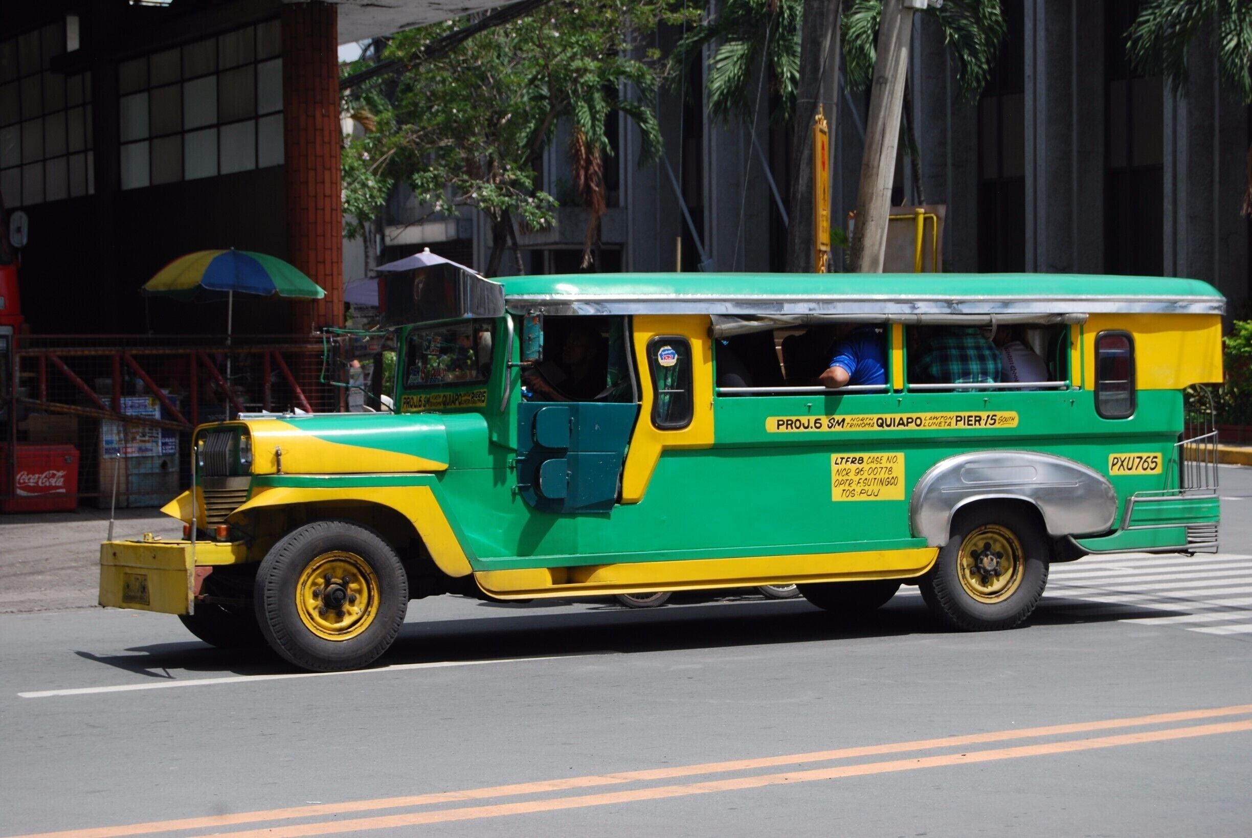 Jeepney's are a common way for locals and tourists to travel around Manila. Each of these old style, #colorful trucks are unique inside and out! Many drivers decorate their truck with paintings or even festive lights! 