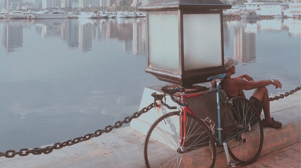 While waiting for the famous Manila Bay sunset.