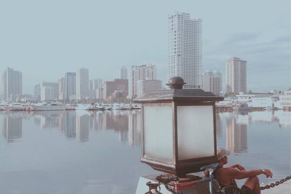 While waiting for the famous Manila Bay sunset.