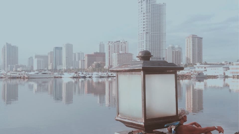 While waiting for the famous Manila Bay sunset.