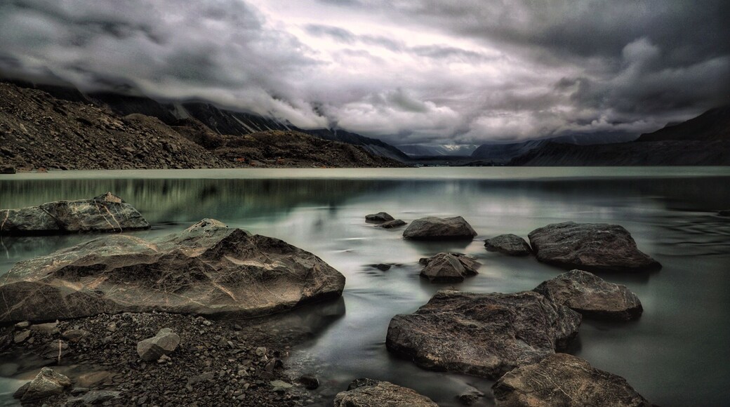 With the weather being closed in for most of the day, our planned destination was revised and here we were. A 30 minute leisurely walk through Alpine paths, a scramble down the rocks and this is what you could be met with. Icebergs still floating in Spring (not that the weather felt like Spring), moody skies and in the distance the glacial ice. This area, not that long ago was more glacial than lake. Yes, it was once Tasman Glacier. You could stay here for hours, I did. #newzealand #glacier #lake #nature
