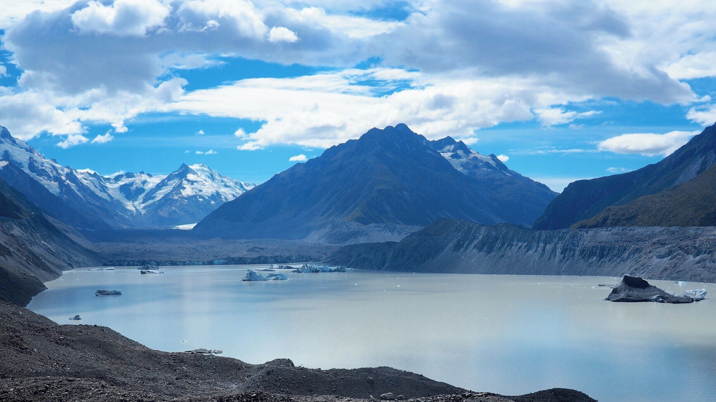 The Tasman Glacier View is at the end of short but steep walk within New Zealand's Aoraki/Mount Cook National Park. The views of the glacier lake and its icebergs are fantastic enough but you can also take a boat or kayak trip onto the lake itself. From this higher vantage point though, you can get a perspective on how big some of these icebergs are compared to the tiny specks of the boats.