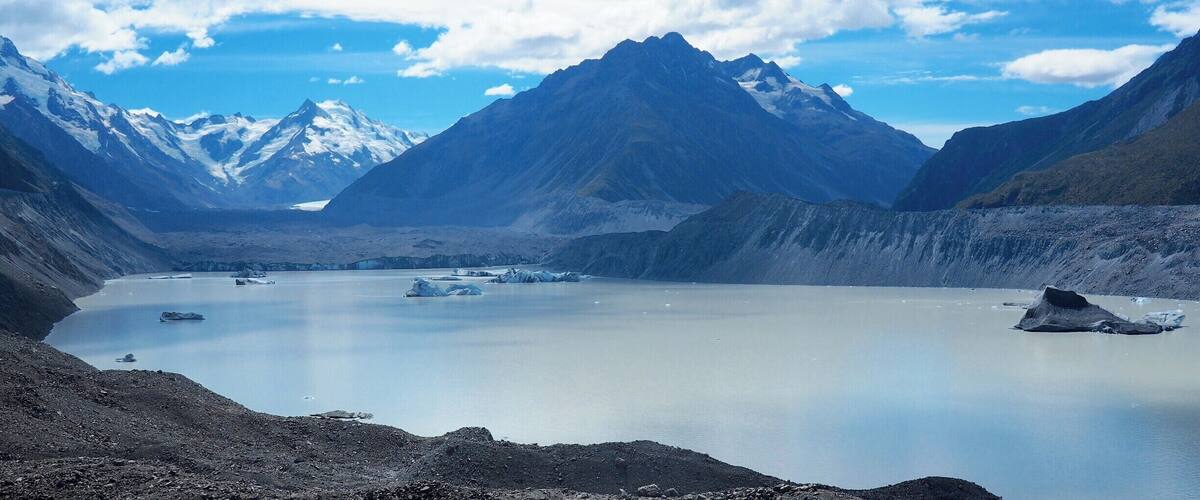 The Tasman Glacier View is at the end of short but steep walk within New Zealand's Aoraki/Mount Cook National Park. The views of the glacier lake and its icebergs are fantastic enough but you can also take a boat or kayak trip onto the lake itself. From this higher vantage point though, you can get a perspective on how big some of these icebergs are compared to the tiny specks of the boats.