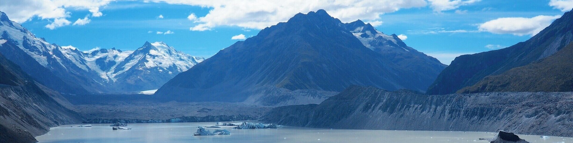 The Tasman Glacier View is at the end of short but steep walk within New Zealand's Aoraki/Mount Cook National Park. The views of the glacier lake and its icebergs are fantastic enough but you can also take a boat or kayak trip onto the lake itself. From this higher vantage point though, you can get a perspective on how big some of these icebergs are compared to the tiny specks of the boats.