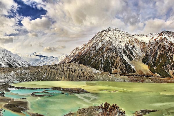 This was taken at the Kea Point lookout at Mt Cook National Park. It was an easy trek and the view was phenomenal. We got there just as the sun was about to go behind the mountains so I was glad that I could capture what was left of the light on those snow-capped peaks. The giant mountain there is Mt Wakefield and just to the left of it is Mt Cook, nearly fully covered by those stubborn clouds. The Muller Glacier down the bottom definitely gave the image a good colour contrast as well.