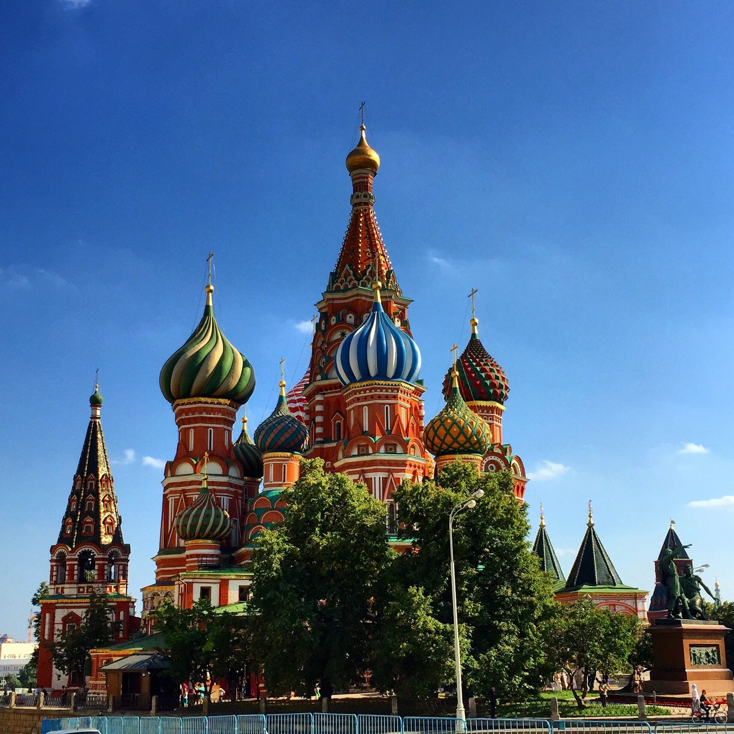 The colorful architecture of Saint Basil's Cathedral with multiple onion domes.