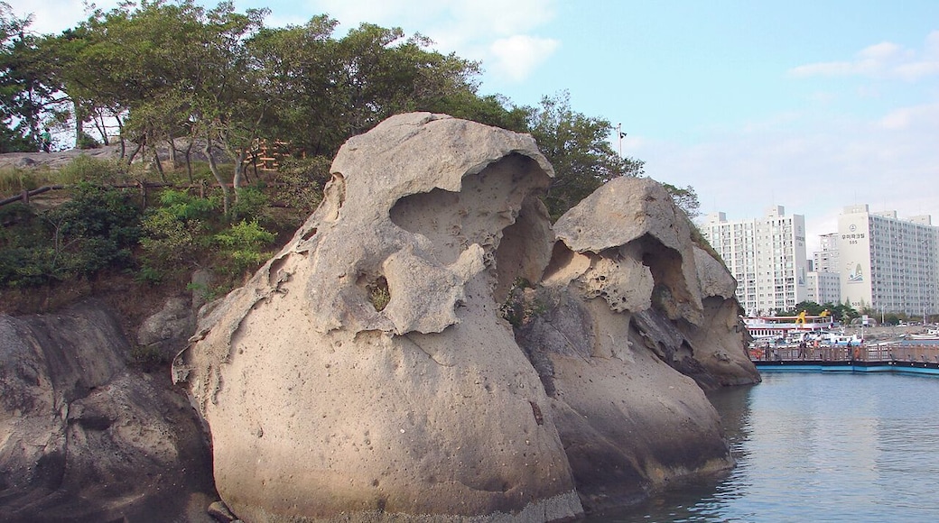 Sandstone and Tafoni formations found on the shore of Mokpo's east harbor, at the mouth of he Yeongsan River, South Jeolla Province, South Korea. The name of this formation at Mokpo is "Gatbawi", meaning a rock shaped like a Gat, a traditional Korean constume item worn like a hat.
